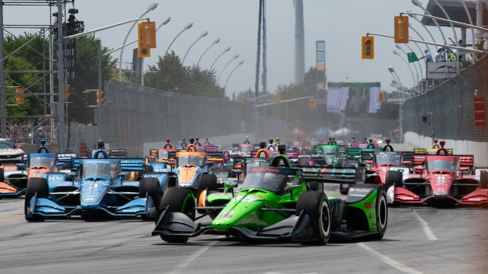 IndyCars speeding through the Honda Indy Toronto track
