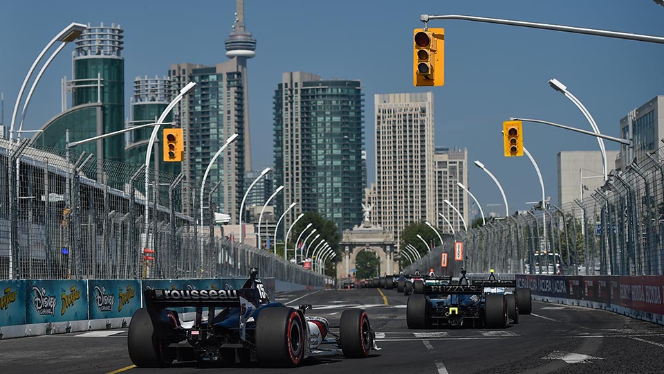 NTT INDYCAR SERIES cars on track at the Honda Indy Toronto