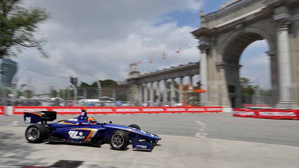 Indy Lights car through turn 1 at the Honda Indy Toronto
